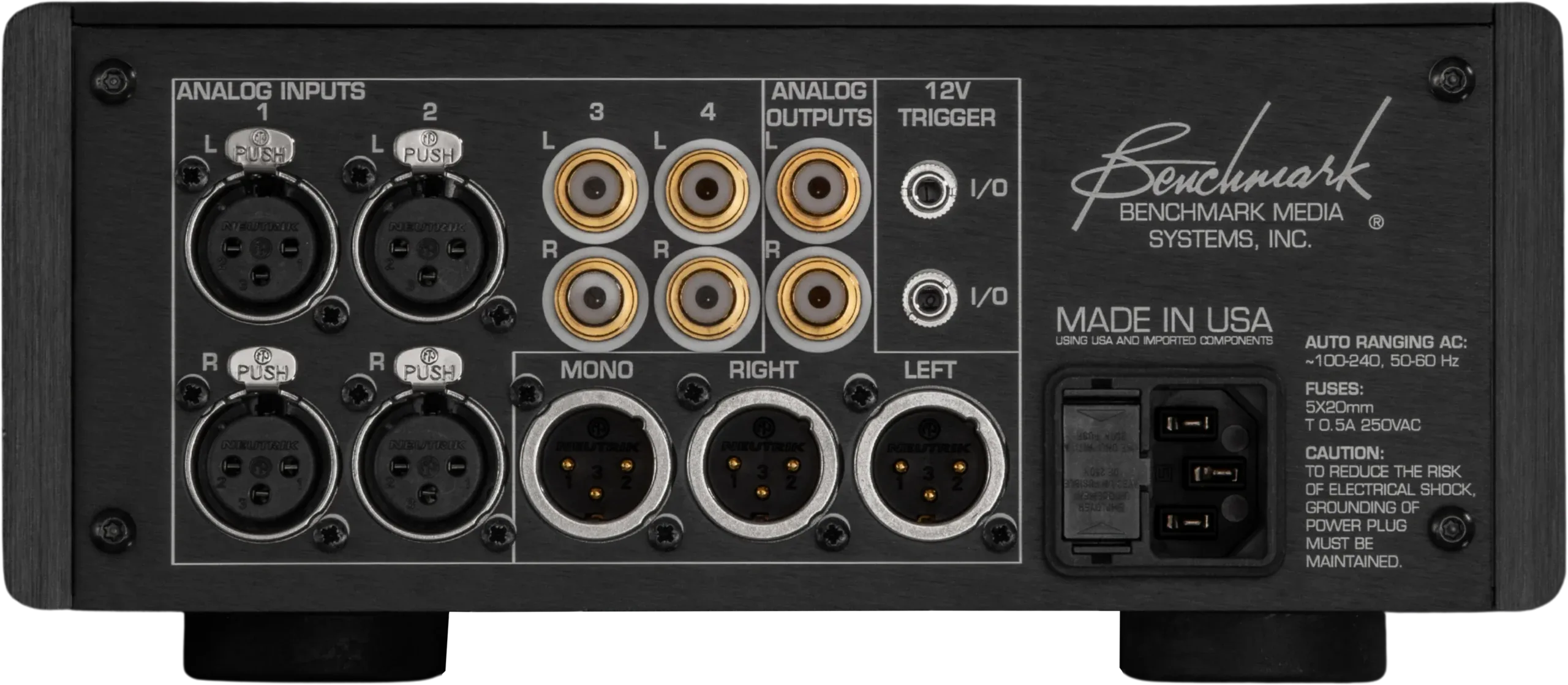 Benchmark LA4 rear panel showing analog XLR inputs, RCA outputs in gold, and XLR connectors against black background