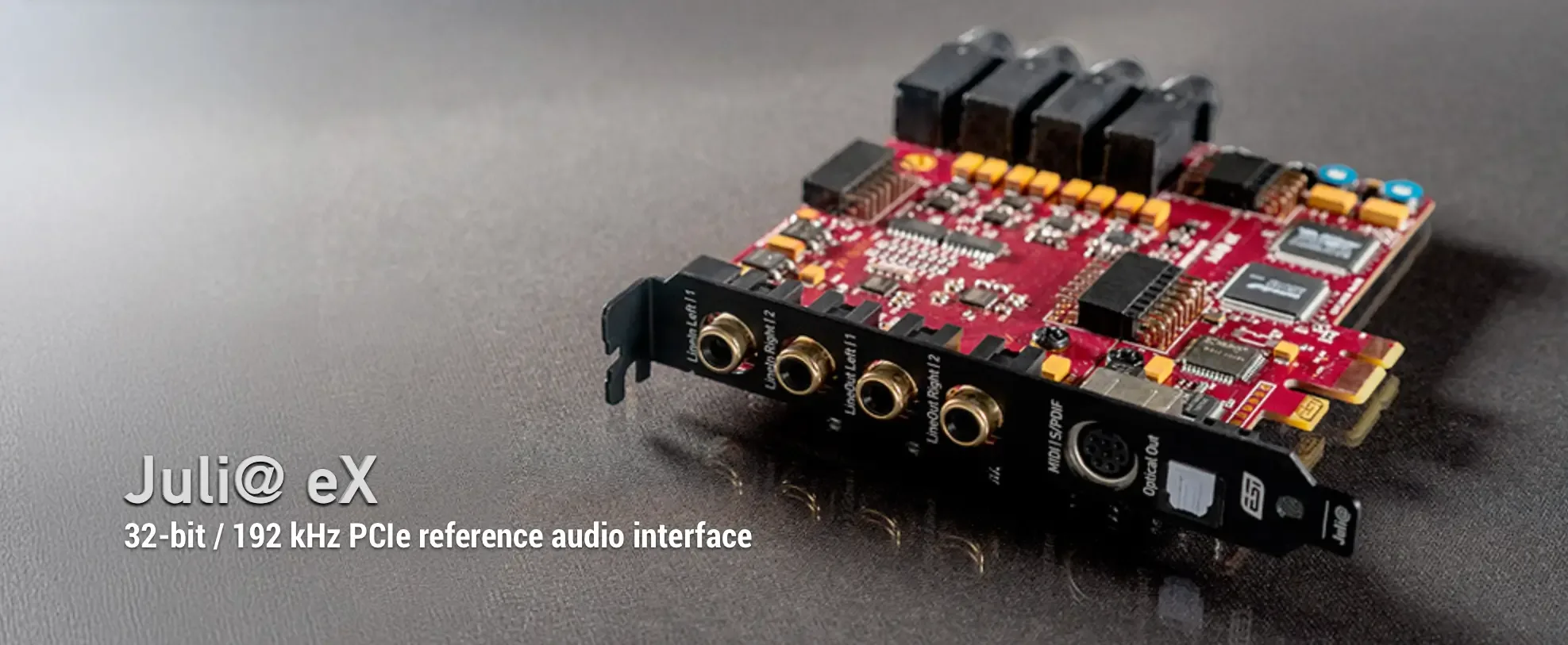 ESI Juli@ eX PCIe audio interface at angle showing red circuit board, four gold RCA connectors, and black rear panel