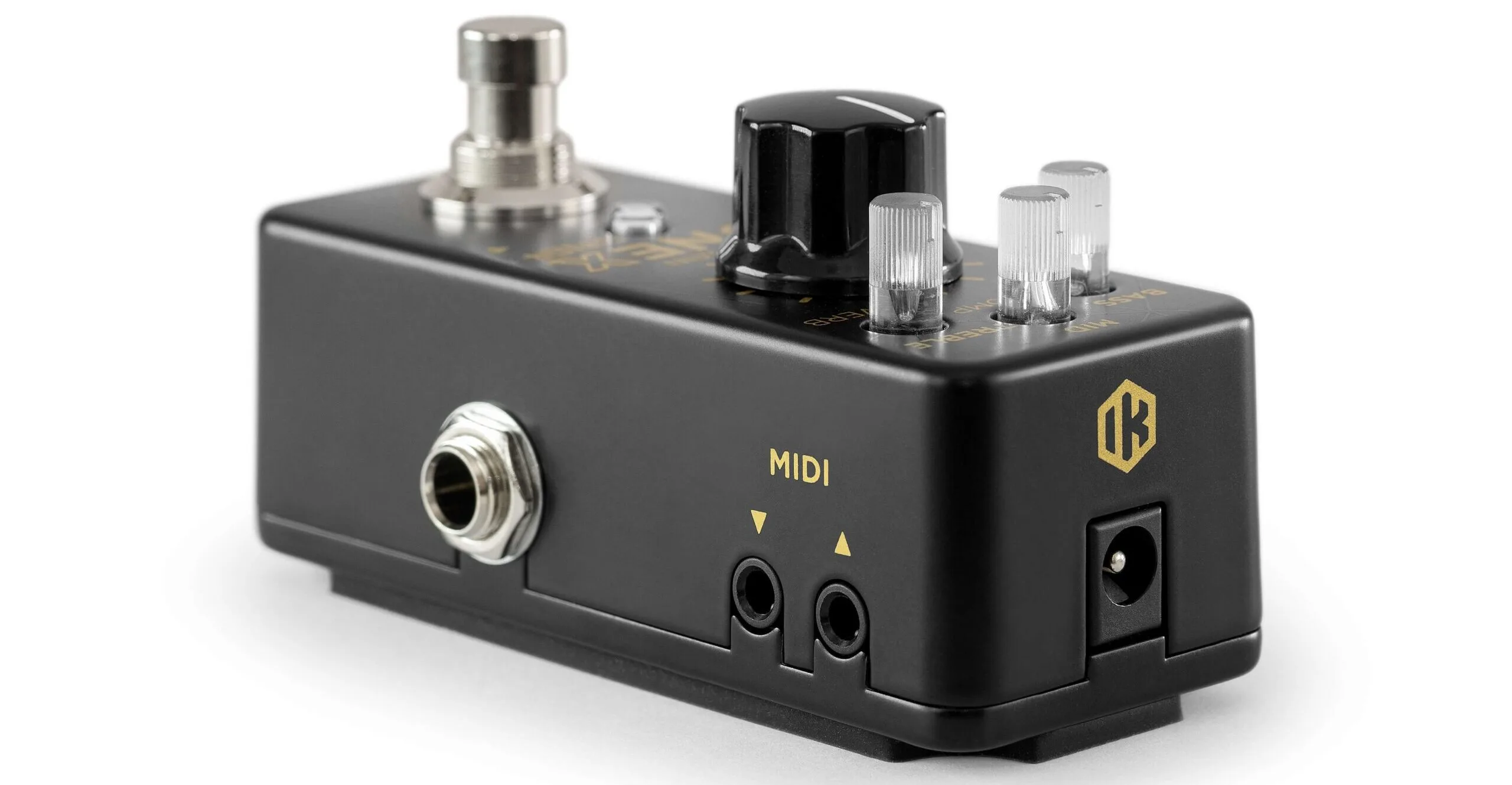 Black TONEX ONE+ guitar pedal with gold branding, silver footswitch, MIDI controls, and tube-style knobs on white background