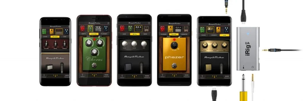 iRig UA audio interface with 3.5mm cable and yellow instrument cable on white background
