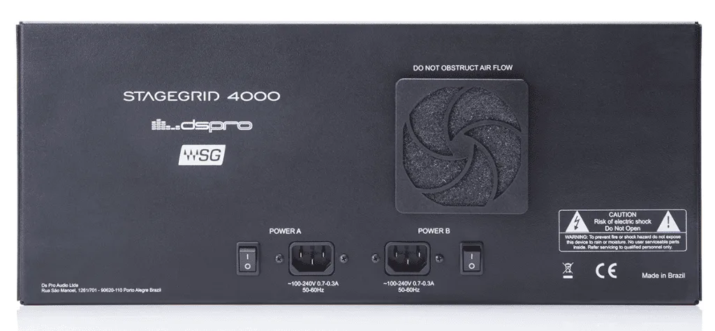 Rear panel of Waves DSPRO StageGrid 4000 audio processor showing dual power inputs, cooling fan, and safety warnings