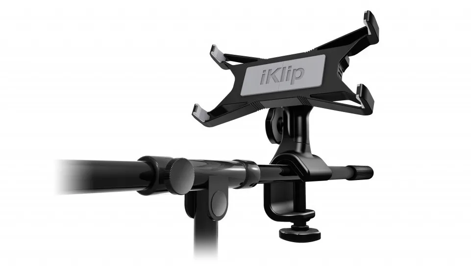 iKlip Xpand tablet holder mounted on microphone stand arm, black clamp with gray panel