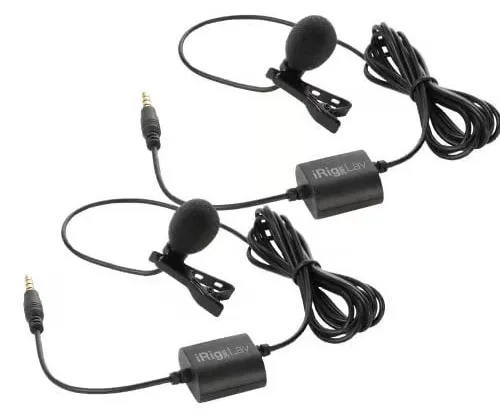 Two black iRig lavalier microphones with windscreens and 3.5mm connectors arranged on white background