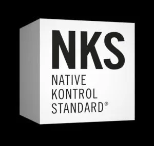 White box with black NKS Native Kontrol Standard branding, shown at three-quarter angle against black background
