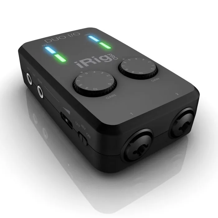 iRig Pro Duo I/O audio interface, angled view showing two input channels with blue and green LED meters, two control knobs, and side-mounted