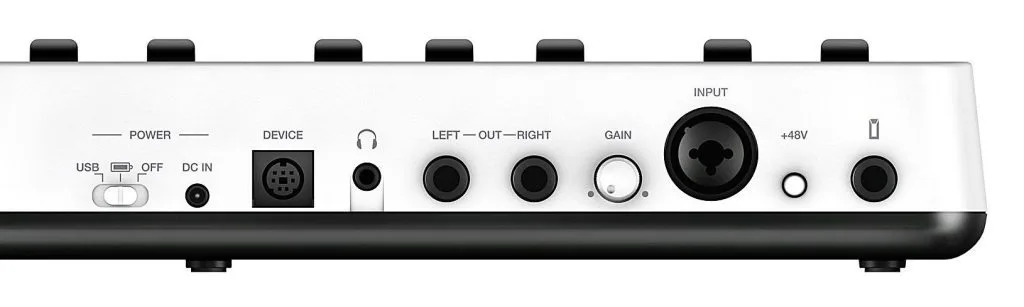 iRig Keys I/O 49 control surface top panel showing power, USB, audio inputs/outputs, and 49-key keyboard section on white background