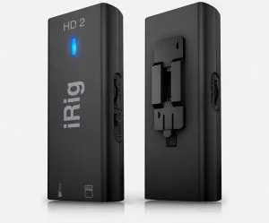 iRig HD2 guitar interface shown front and back views, black compact device with blue LED indicator and mounting bracket