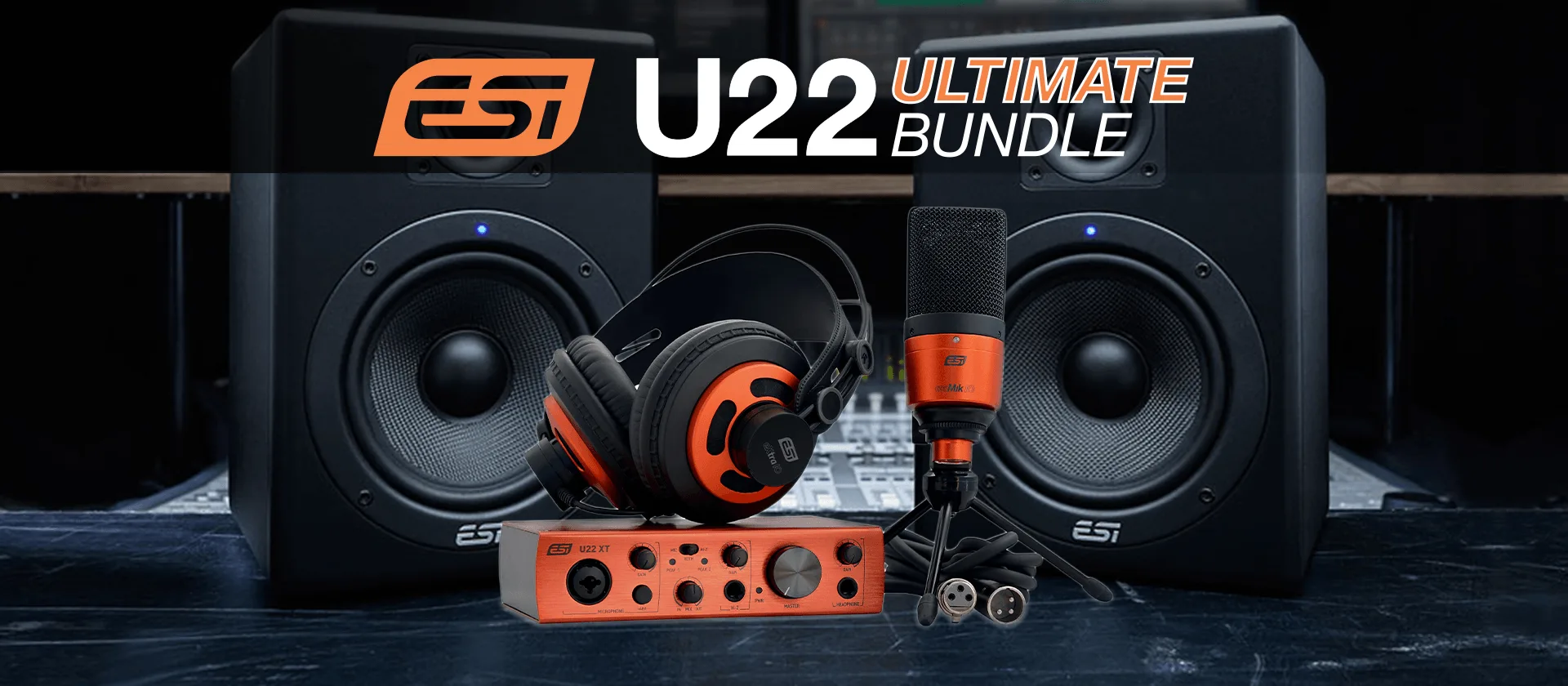 ESI U22 XT Ultimate Bundle: orange and black studio gear including two monitor speakers, microphone, headphones, and control interface