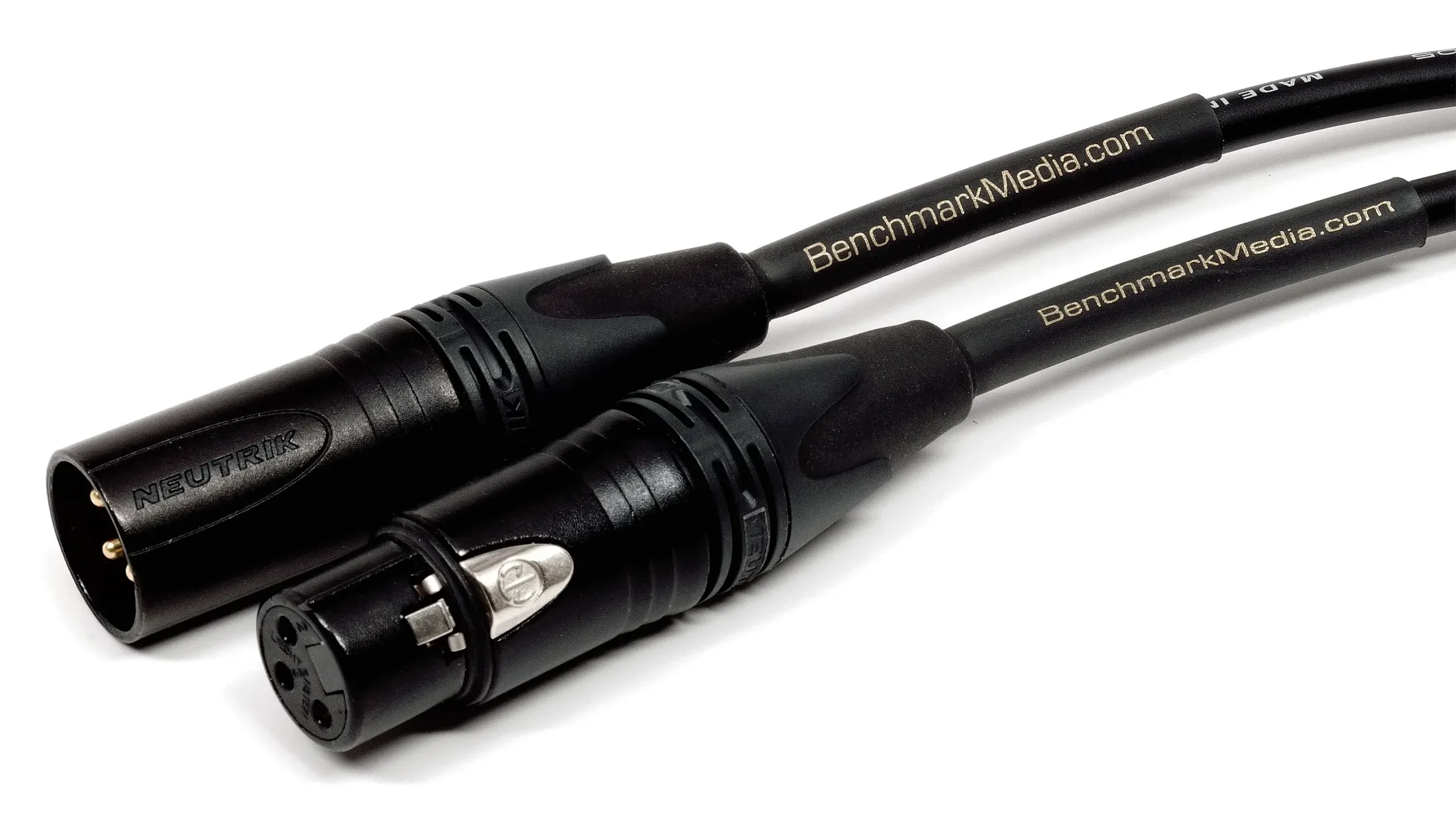 Two black XLR cables with Neutrik connectors and BenchmarkMedia.com branding on white background