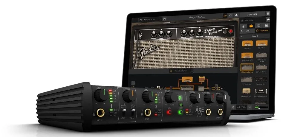 Black AXE I/O audio interface with input controls displayed alongside Fender amp simulation software on monitor
