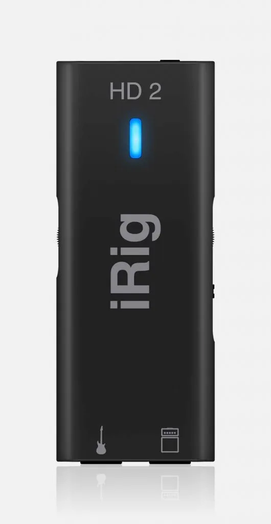 iRig HD2 guitar audio interface, black rectangular device with blue LED indicator and guitar/USB icons at bottom