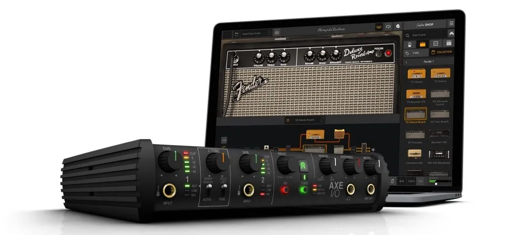 AXE I/O audio interface with LED meters and knobs, displayed alongside Fender amp plugin on computer screen