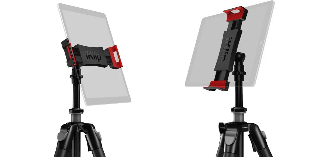 iKlip 3 Video tablet holder in red and black shown in two angles on tripod stands against white background