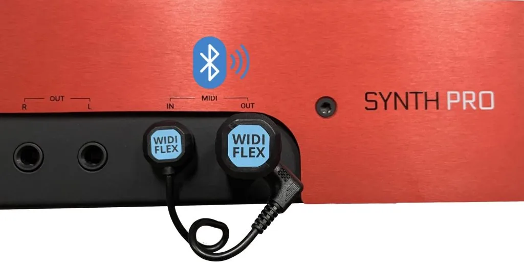 Red Nektar Synth Pro keyboard showing two black WIDIFLEX wireless controllers with blue labels plugged in