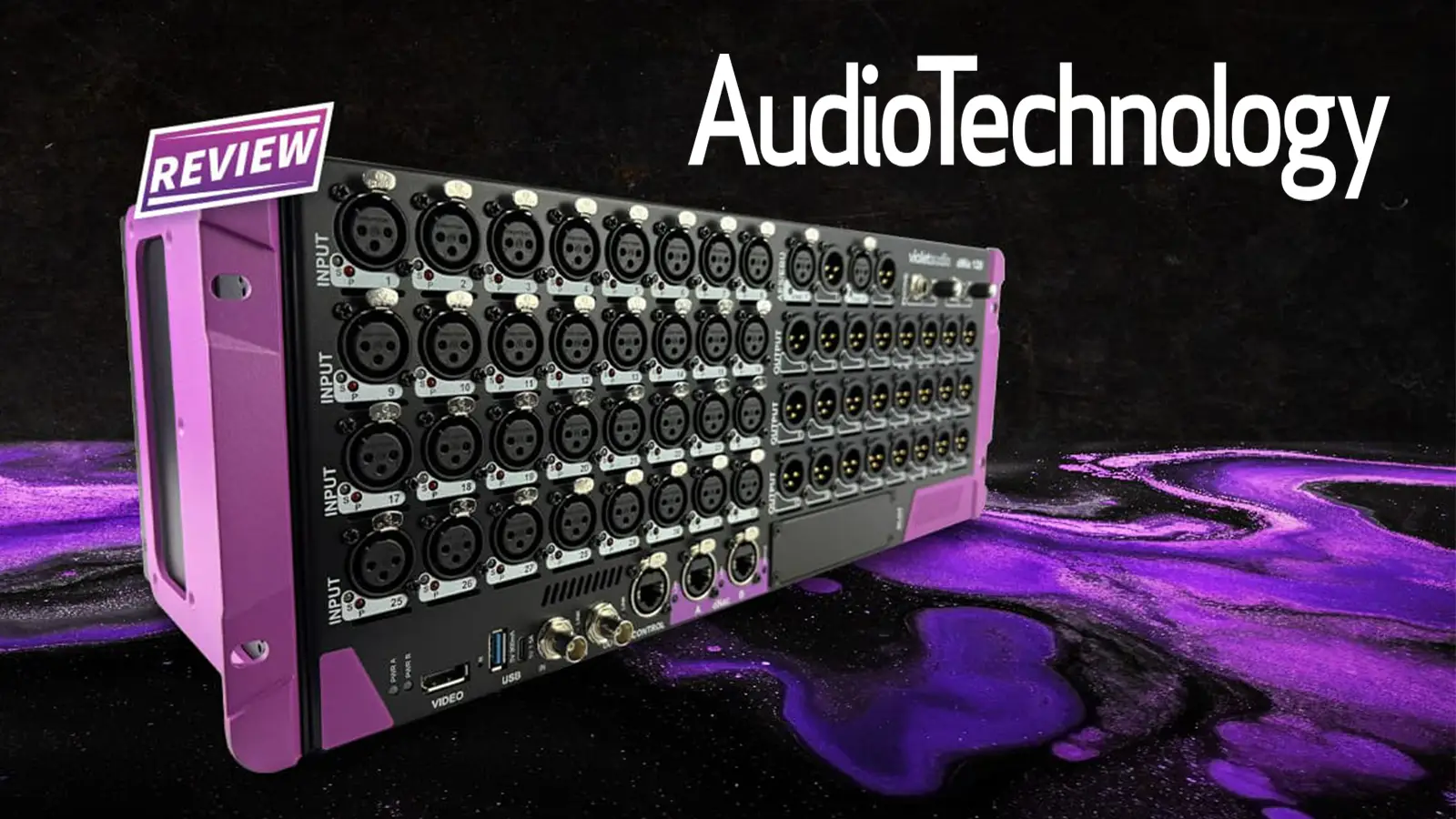 Violet Audio dMix128 mixing console with purple casing and 128 XLR input channels, angled view against dark background